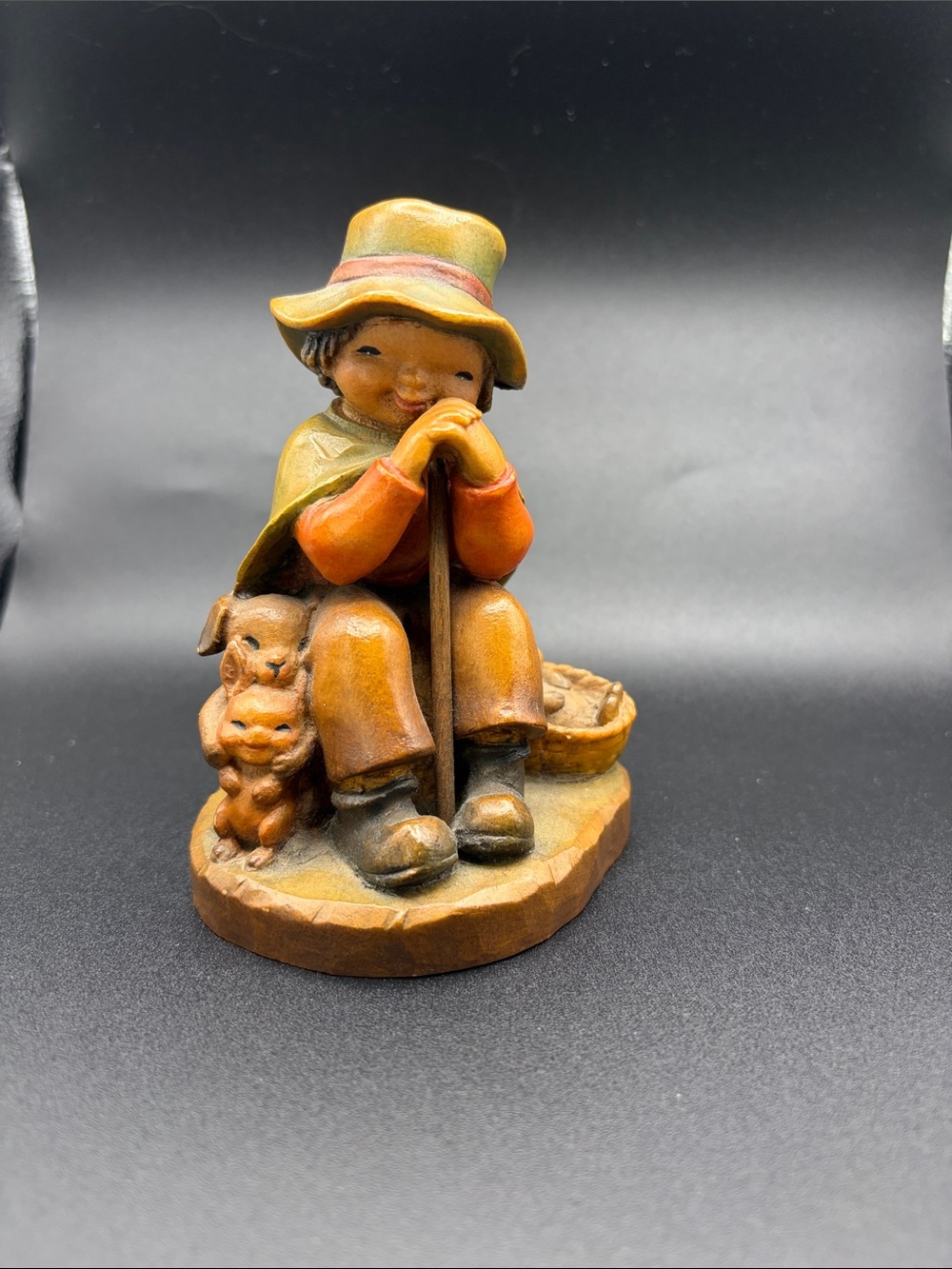 Vintage Anri carved figurine. “The Rest”